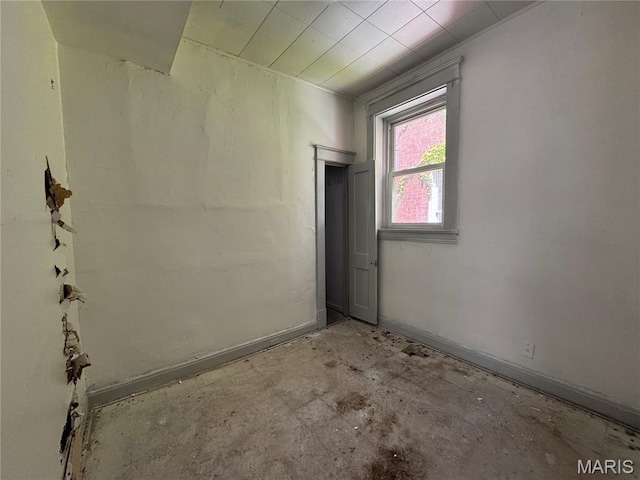 3929 Pennsylvania, Saint Louis, MO 63118 - empty room featuring concrete flooring and baseboards