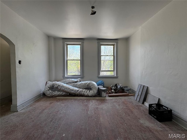 3929 Pennsylvania, Saint Louis, MO 63118 - bedroom featuring arched walkways and wood finished floors
