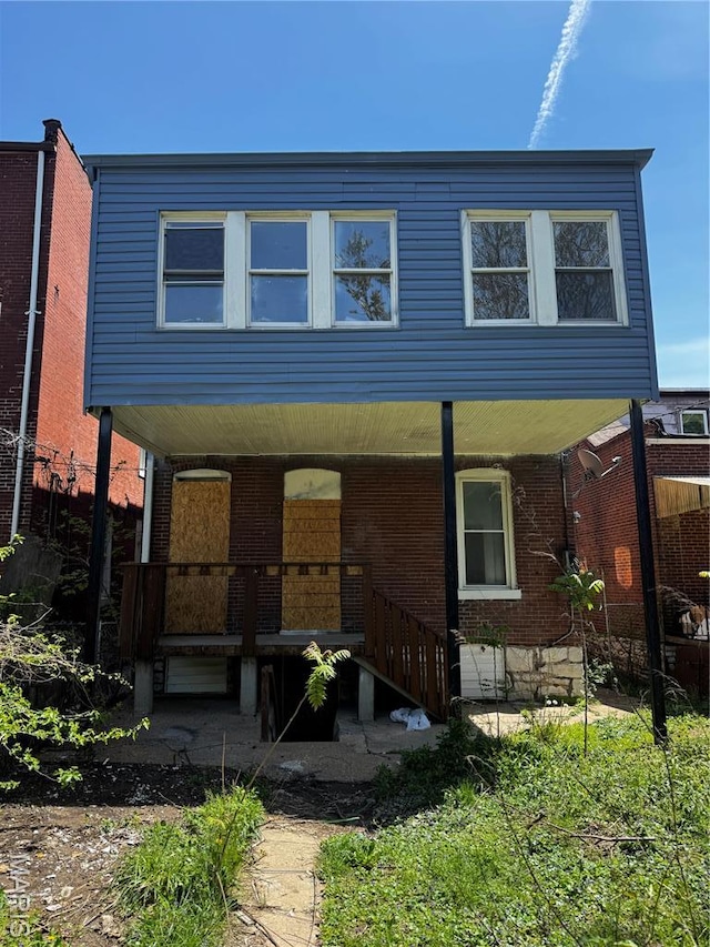 3929 Pennsylvania, Saint Louis, MO 63118 - view of property featuring covered porch and brick siding