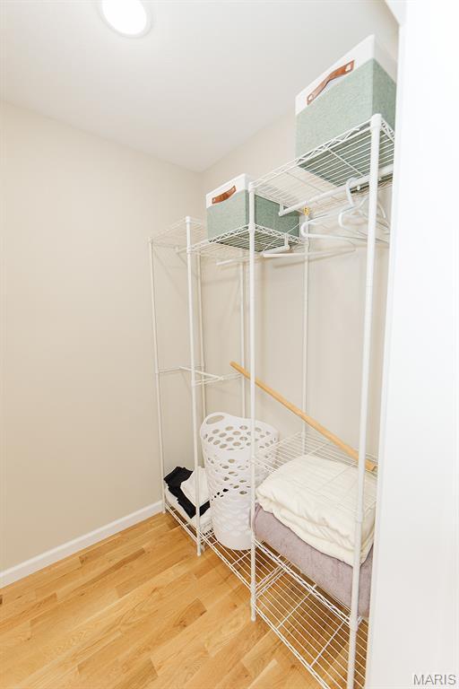 300 E 11th St, Salem, MO 65560 - bedroom with wood finished floors and baseboards