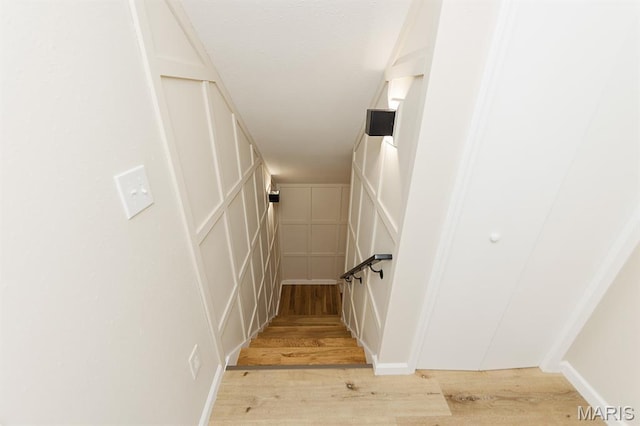 300 E 11th St, Salem, MO 65560 - stairs featuring a decorative wall and wood finished floors