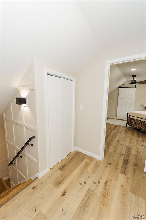300 E 11th St, Salem, MO 65560 - bonus room featuring vaulted ceiling, wood finished floors, and a ceiling fan