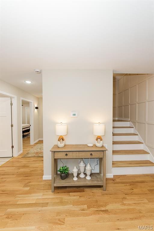 300 E 11th St, Salem, MO 65560 - corridor featuring wood finished floors, stairway, and recessed lighting