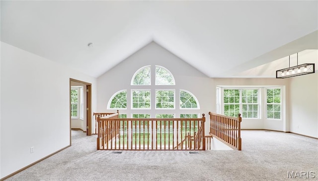 3989 Kim Kelly Dr, Harvester Township, MO 63304 - corridor with carpet flooring, an upstairs landing, and high vaulted ceiling