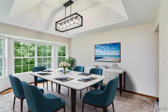 3989 Kim Kelly Dr, Harvester Township, MO 63304 - dining area with a chandelier, a desk, and a raised ceiling
