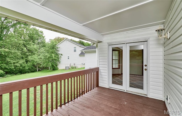 3989 Kim Kelly Dr, Harvester Township, MO 63304 - wooden deck with a lawn and french doors