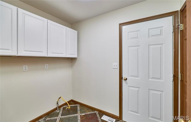 3989 Kim Kelly Dr, Harvester Township, MO 63304 - washroom featuring baseboards and tile patterned flooring