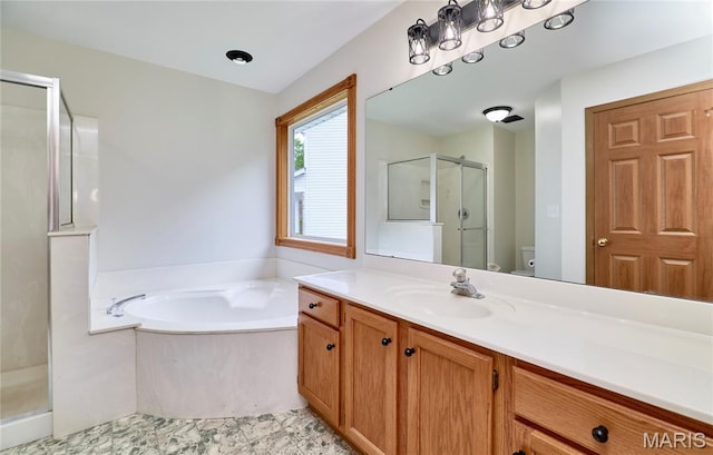 3989 Kim Kelly Dr, Harvester Township, MO 63304 - bathroom featuring a stall shower, vanity, and a garden tub