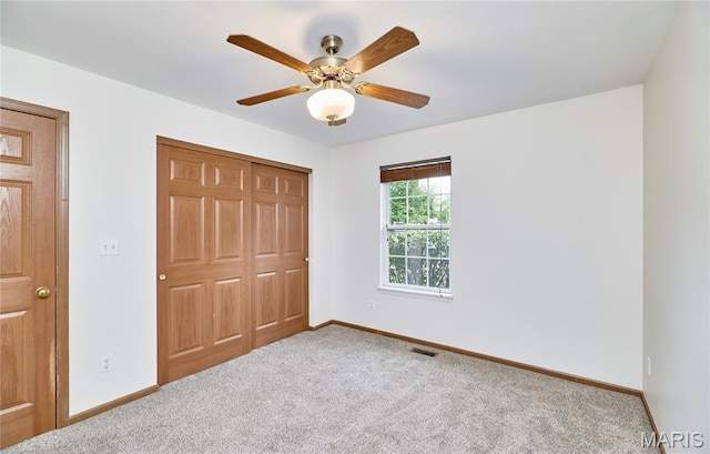 3989 Kim Kelly Dr, Harvester Township, MO 63304 - unfurnished bedroom with carpet floors, a closet, and a ceiling fan