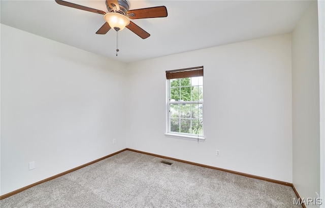 3989 Kim Kelly Dr, Harvester Township, MO 63304 - carpeted spare room with baseboards and a ceiling fan