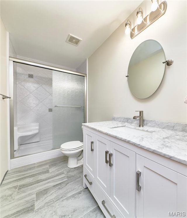 3989 Kim Kelly Dr, Harvester Township, MO 63304 - bathroom featuring vanity and a shower stall