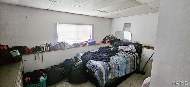 14417 Cape Charles Ct, Florissant, MO 63034 - bedroom featuring a paneled ceiling and tile patterned flooring