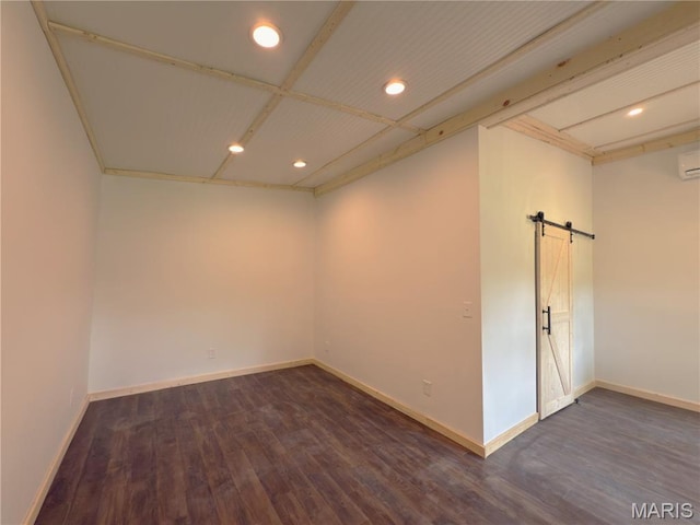 109 Preston St, Crocker, MO 65452 - spare room featuring a barn door, wood finished floors, recessed lighting, and an AC wall unit