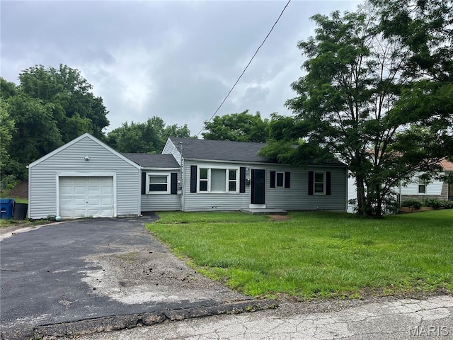 605 Abston Ave, Saint Louis, MO 63135 - single story home with an attached garage, asphalt driveway, and a front lawn