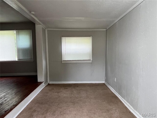 605 Abston Ave, Saint Louis, MO 63135 - carpeted empty room featuring healthy amount of natural light