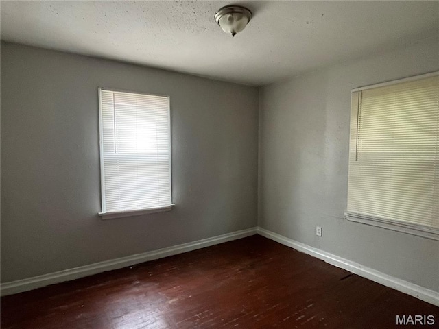 605 Abston Ave, Saint Louis, MO 63135 - empty room featuring wood finished floors and baseboards