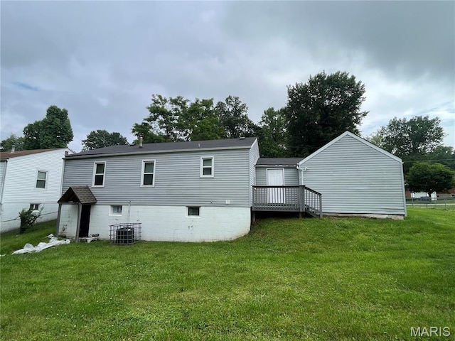 605 Abston Ave, Saint Louis, MO 63135 - rear view of property with a yard and a deck