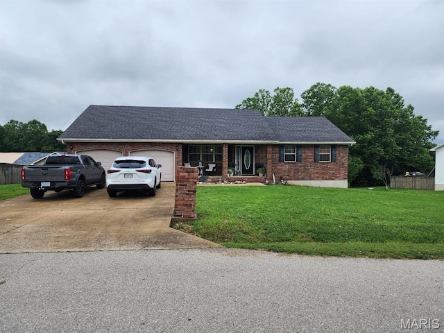 20470 London Ln, Waynesville, MO 65583 - single story home with an attached garage, driveway, a front yard, brick siding, and a shingled roof