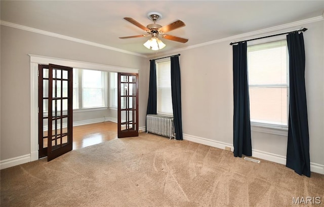 5322 Lansdowne Ave, Saint Louis, MO 63109 - carpeted empty room featuring radiator, a ceiling fan, and crown molding