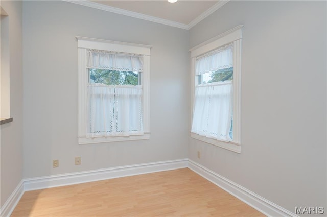 5322 Lansdowne Ave, Saint Louis, MO 63109 - unfurnished room with healthy amount of natural light, ornamental molding, and light wood-style flooring