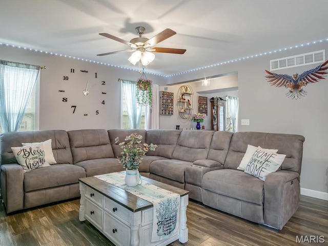 1050 Creekside Dr, Waterloo, IL 62298 - living area with a ceiling fan and dark wood-style floors