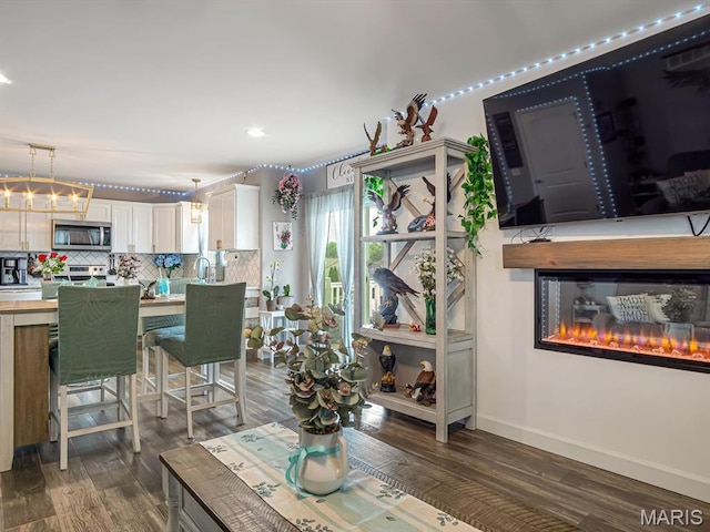 1050 Creekside Dr, Waterloo, IL 62298 - dining space featuring dark wood-style flooring and recessed lighting