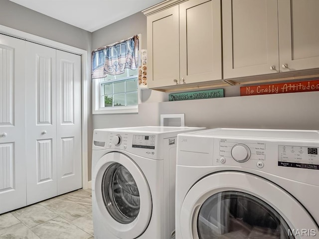 1050 Creekside Dr, Waterloo, IL 62298 - laundry room featuring cabinet space, separate washer and dryer, and light marble finish floors