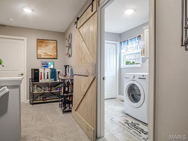 1050 Creekside Dr, Waterloo, IL 62298 - laundry room with washer / clothes dryer and a barn door