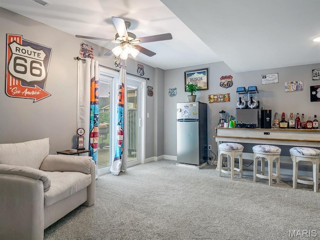 1050 Creekside Dr, Waterloo, IL 62298 - living area featuring a ceiling fan and carpet flooring