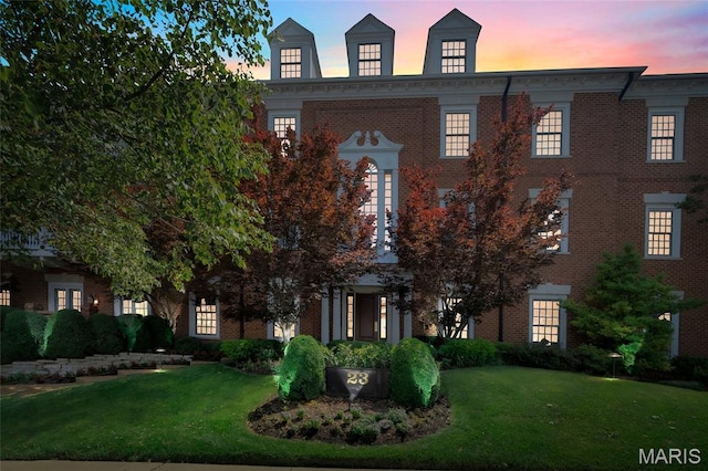 23 Topton Way Unit 2B, Clayton, MO 63105 - colonial home with a front lawn and brick siding