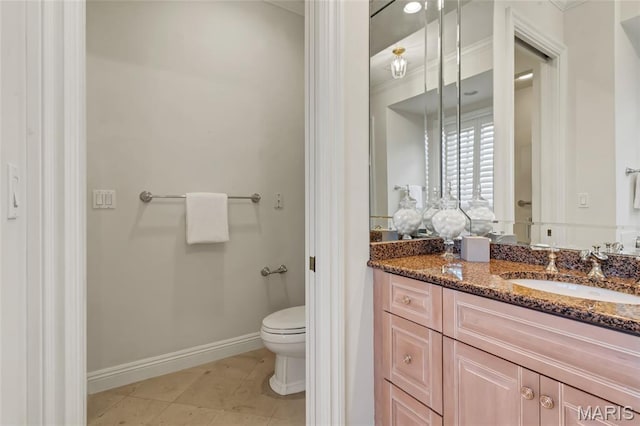 23 Topton Way Unit 2B, Clayton, MO 63105 - bathroom with vanity, crown molding, and tile patterned floors