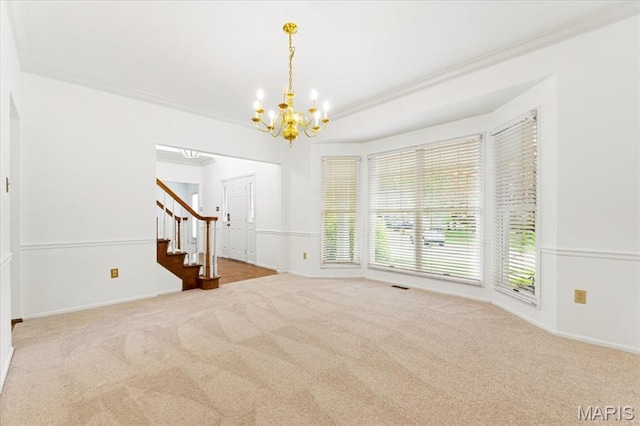 265 Timber Tree Ct, Wildwood, MO 63011 - spare room with a chandelier, stairway, carpet floors, and crown molding