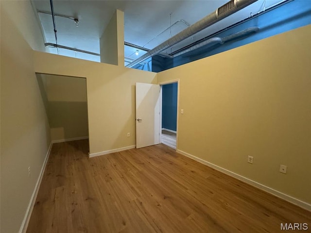 1520 Washington Ave Unit 617, Saint Louis, MO 63103 - below grade area with wood finished floors and baseboards