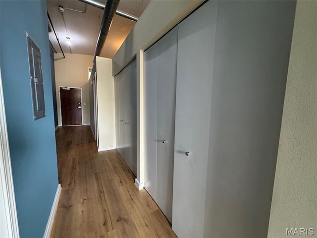 1520 Washington Ave Unit 617, Saint Louis, MO 63103 - hallway featuring light wood finished floors and electric panel