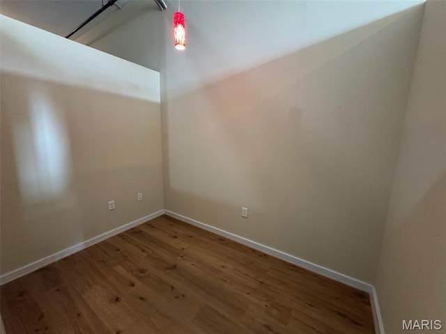 1520 Washington Ave Unit 617, Saint Louis, MO 63103 - spare room with wood finished floors and baseboards