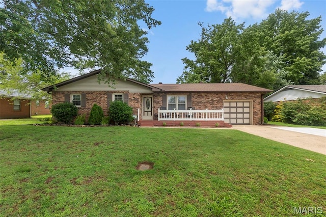 1004 Willow Ln, Sikeston, MO 63801 - single story home with an attached garage, driveway, a front lawn, and brick siding