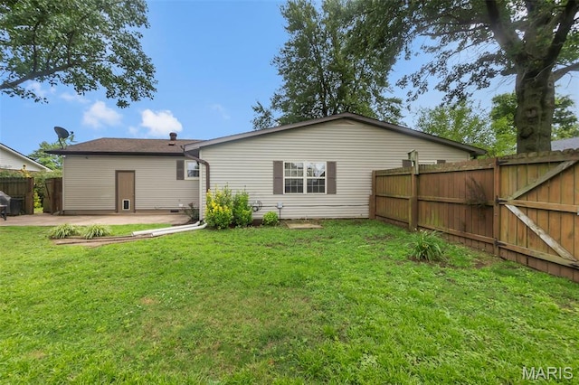 1004 Willow Ln, Sikeston, MO 63801 - back of house with a patio area and a gate
