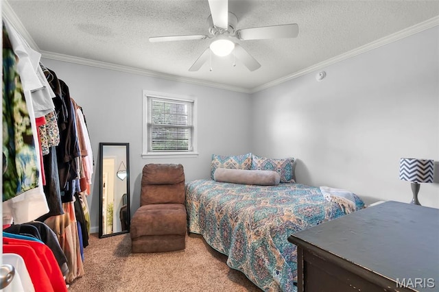 1004 Willow Ln, Sikeston, MO 63801 - carpeted bedroom with crown molding, a textured ceiling, and a ceiling fan