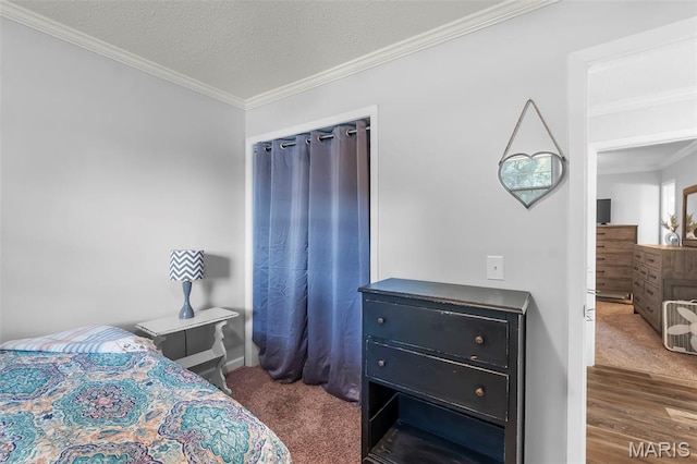 1004 Willow Ln, Sikeston, MO 63801 - carpeted bedroom featuring crown molding and wood finished floors