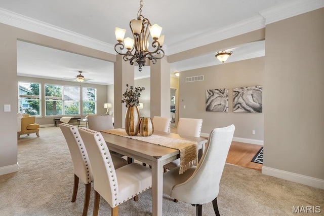 714 Oriental Lily Dr, Ofallon, MO 63366 - dining room with crown molding, light colored carpet, a chandelier, and a ceiling fan