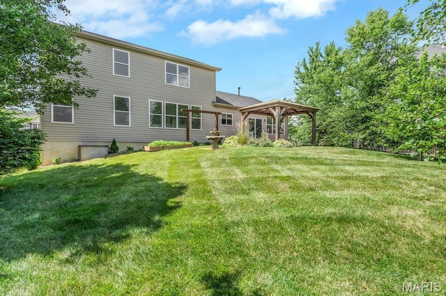 714 Oriental Lily Dr, Ofallon, MO 63366 - back of house with a gazebo and a yard