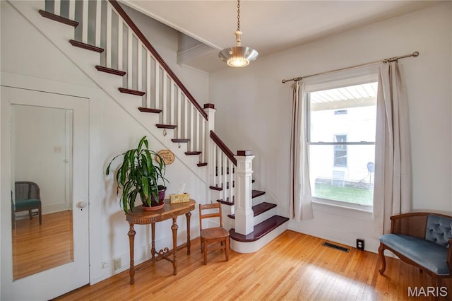 408 N N Main St, Carrollton, IL 62016 - entrance foyer featuring wood finished floors and stairs