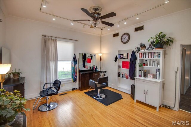 408 N N Main St, Carrollton, IL 62016 - misc room with track lighting, ceiling fan, crown molding, and light wood-type flooring