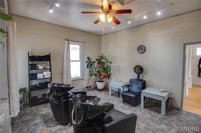 408 N N Main St, Carrollton, IL 62016 - living room with track lighting, ceiling fan, and stone finish flooring