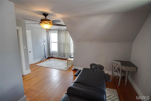408 N N Main St, Carrollton, IL 62016 - living room with hardwood / wood-style flooring, ceiling fan, and vaulted ceiling