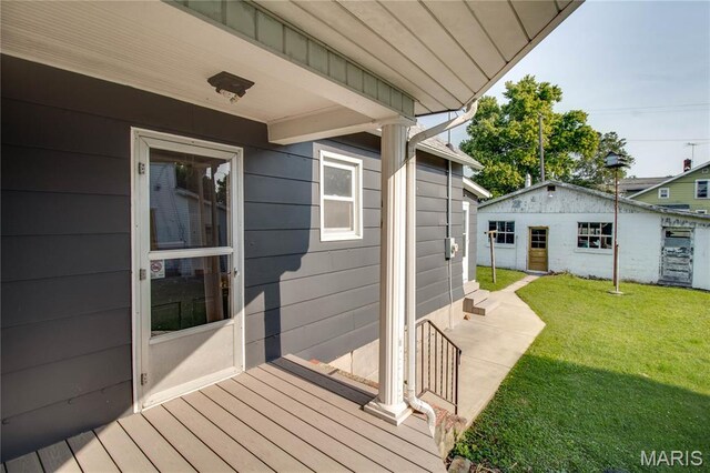 408 N N Main St, Carrollton, IL 62016 - deck featuring a lawn