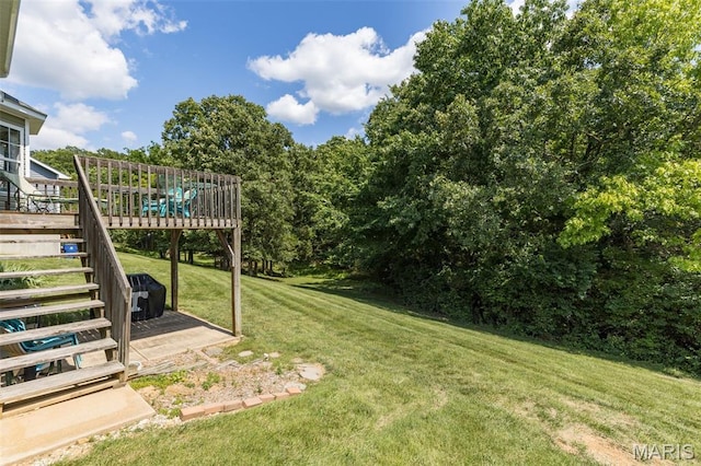 24 Adventura Dr, Festus, MO 63028 - view of grassy yard with stairs and a wooden deck