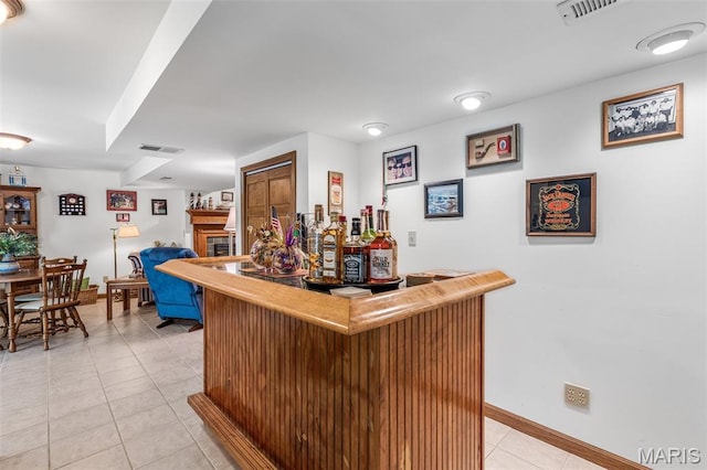24 Adventura Dr, Festus, MO 63028 - indoor dry bar featuring light tile patterned floors and baseboards