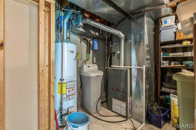24 Adventura Dr, Festus, MO 63028 - utility room with gas water heater and heating unit