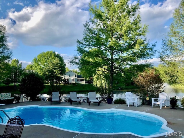 958 Kinsale Dr, Manchester, MO 63021 - view of swimming pool with a patio and a water view